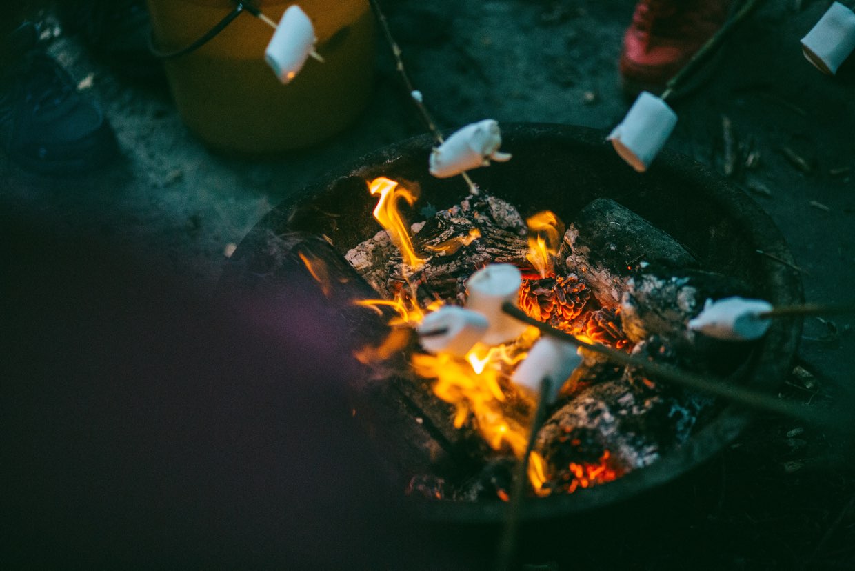 Gathering around fire (Josh Campbell, Unsplash)